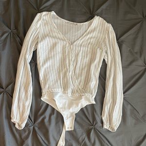 Long sleeve White bodysuit with black polka dots